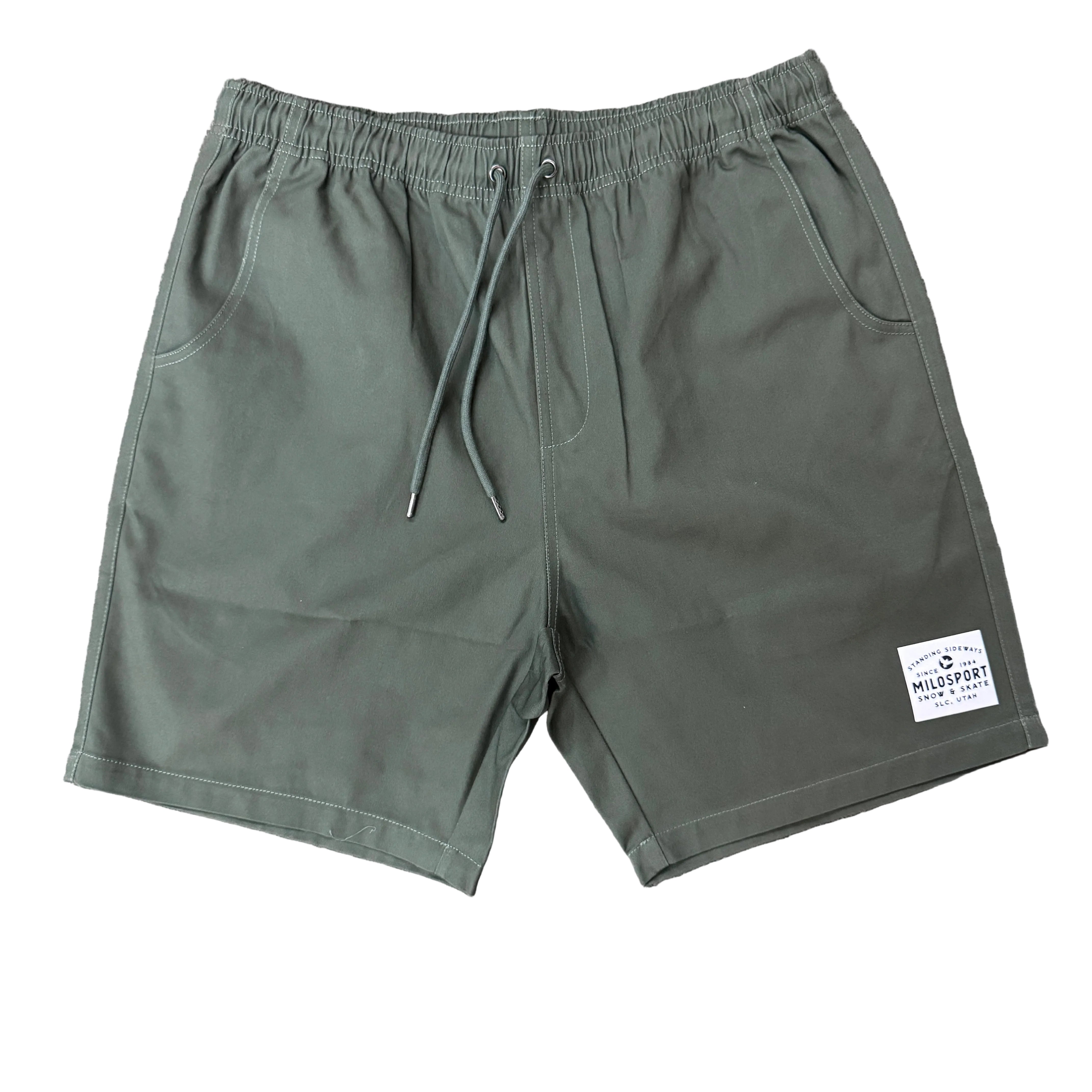 Mens Milosport sideways patch walking short in dark green, full-length view showing waistband and casual fit
