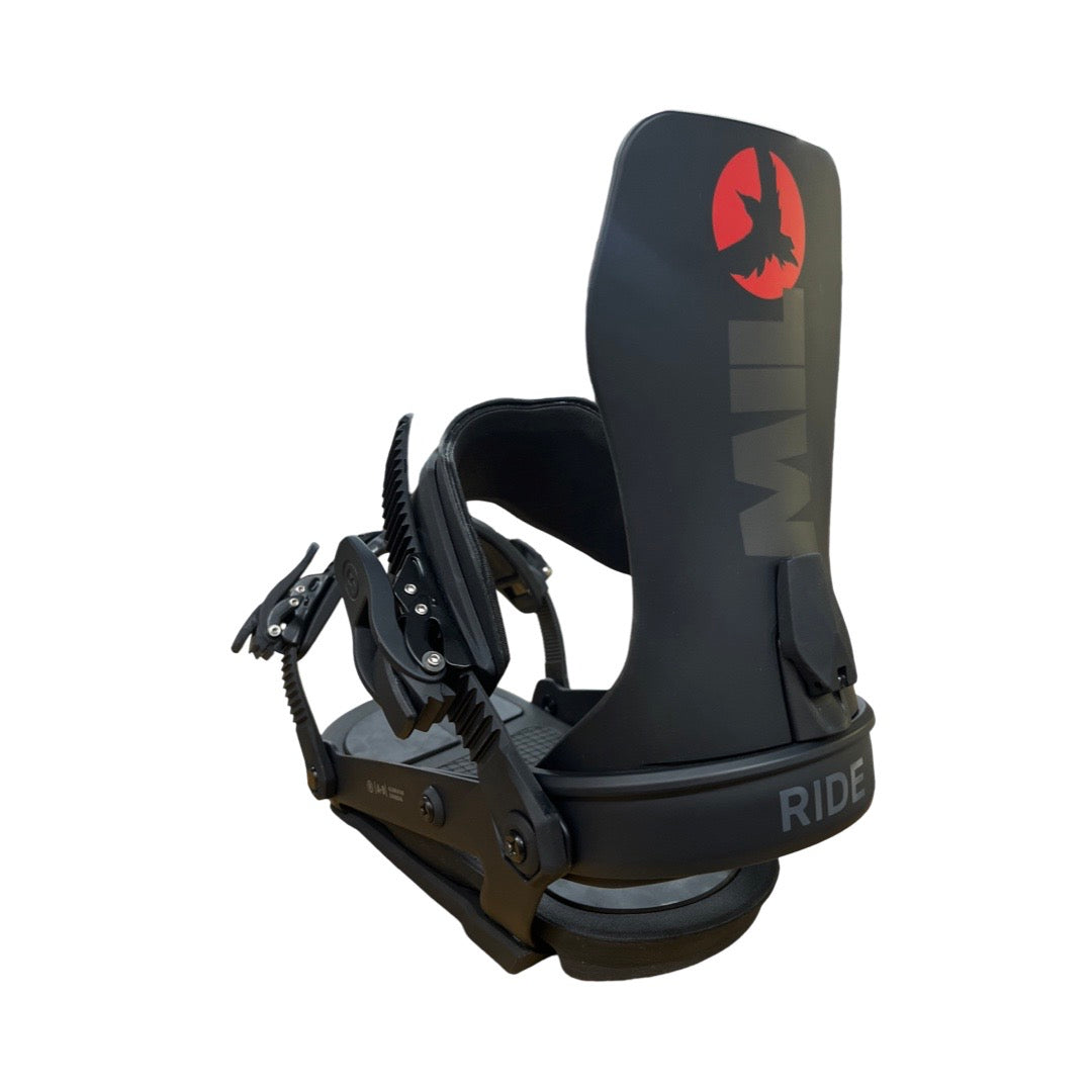 Ride x Milo M-9 snowboard binding in black mounted on a snowboard, showing adjustable straps and high-back support for snowboarding.