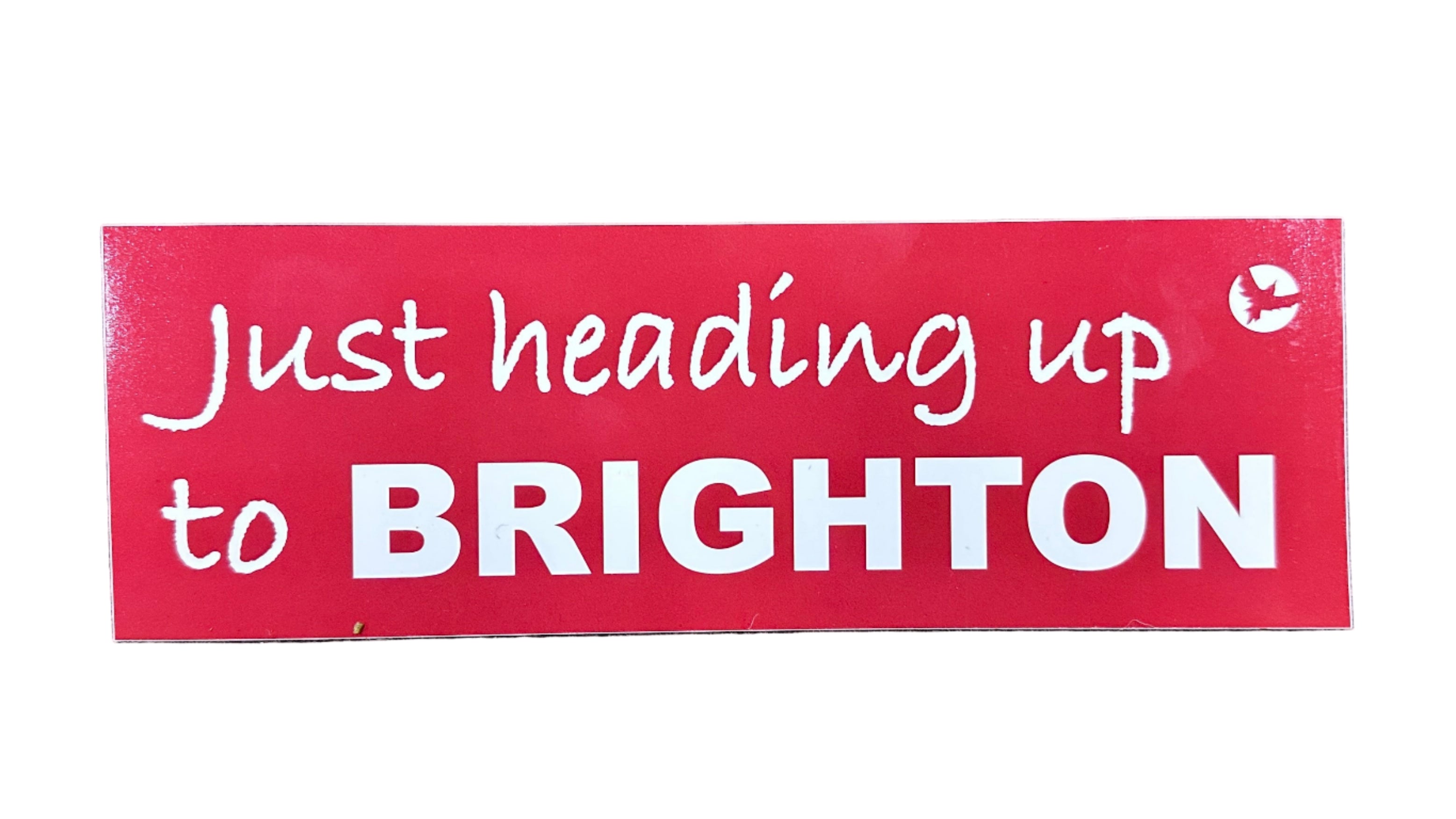 Milosport Just Heading to Brighton bumper sticker in white with black text, designed for car or personal accessories.